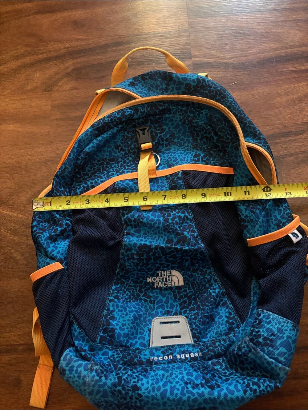 The North Face Recon Squash Teal Leopard Print Backpack with Orange Accents